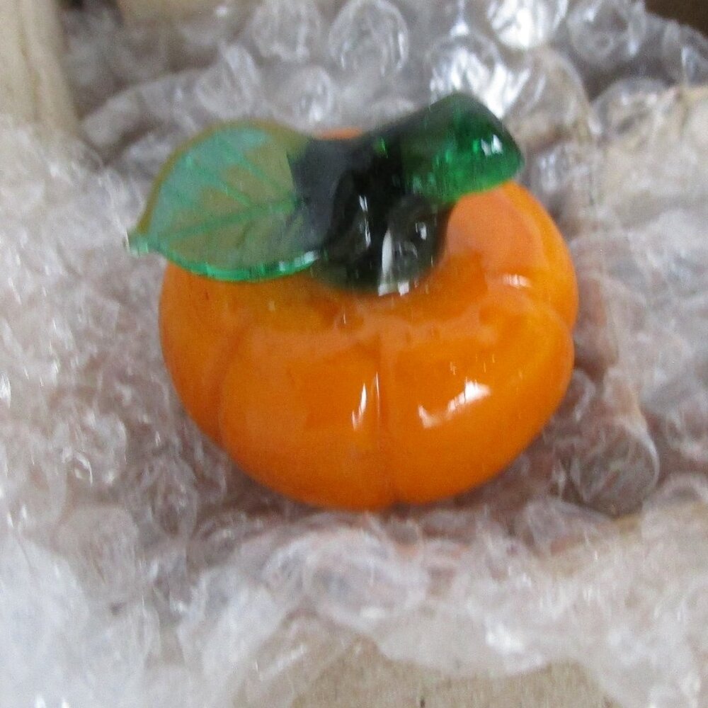 set of tiny solid glass pumpkins